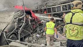 First responders extinguish a fire at the site of an Israeli strike that hit near a hospital in the southern Lebanese city of Tyre on June 1, 2026. Lebanon said an Israeli strike hit near a hospital in the southern city of Tyre on June 1 as the healt