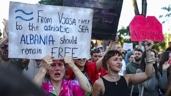 Protesters hold banners during a protest against a luxury resort development planned by a company linked with Donald Trump's son-in-law, Jared Kushner, on an environmentally sensitive part of the Adriatic coast, in Tirana, Albania, June 4, 2026. REUT