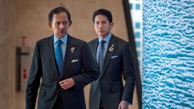 Brunei Sultan Hassanal Bolkiah and his son Prince Abdul Mateen arrive for a welcome ceremony during the 48th Association of Southeast Asian Nations (ASEAN) summit in Cebu, central Philippines on May 8, 2026. (Photo by Ezra Acayan / POOL / AFP)