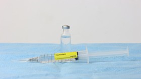 Etomidate drug. Glass bottle and syringe with Etomidate drug in a surface