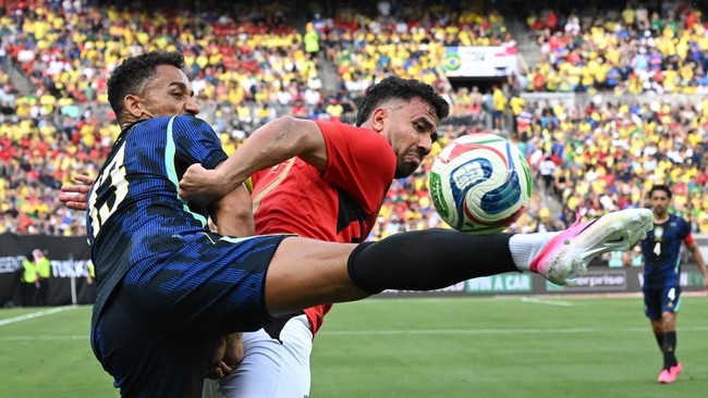 Soccer Football - International Friendly - Brazil v Egypt - Huntington Bank Field, Cleveland, Ohio, U.S. - June 6, 2026 Brazil's Danilo in action with Egypt's Mahmoud Trezeguet IMAGN IMAGES via Reuters/Ken Blaze
