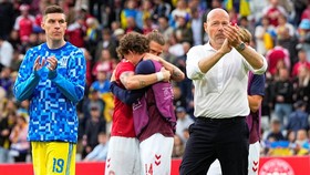 Soccer Football - International Friendly - Denmark v Ukraine - Odense, Denmark - June 7, 2026
Players and Denmark coach Brian Riemer react after the match was abandoned due to Denmark's Christian Eriksen collapsing on the pitch during the match.
Bo