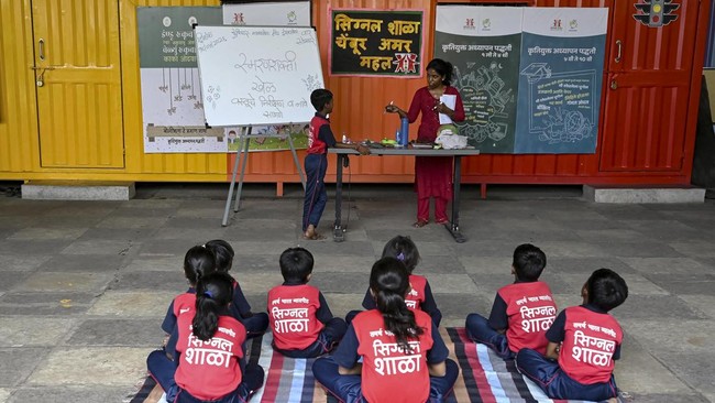 This photograph taken on May 18, 2026 shows children attending an activity class at the
