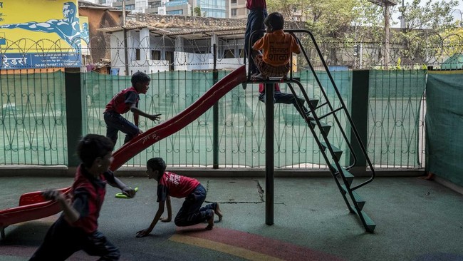 This photograph taken on May 18, 2026 shows children in a play area at the
