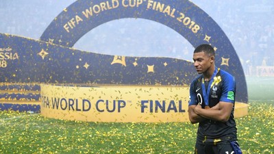 France's forward Kylian Mbappe celebrates at the end of the Russia 2018 World Cup final football match between France and Croatia at the Luzhniki Stadium in Moscow on July 15, 2018. (Photo by Kirill KUDRYAVTSEV / AFP) / RESTRICTED TO EDITORIAL USE -