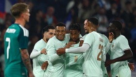 Soccer Football - International Friendly - France v Northern Ireland - Decathlon Arena Stade Pierre-Mauroy, Villeneuve-d'Ascq, France - June 8, 2026 France's Michael Olise celebrates scoring their third goal with Kylian Mbappe and teammates REUTERS/S