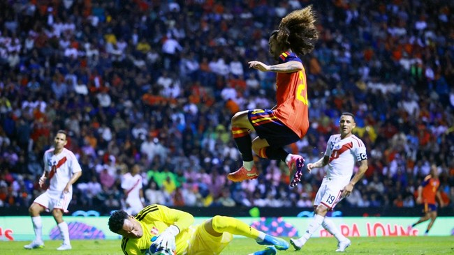 Soccer Football - International Friendly - Peru v Spain - Estadio Cuauhtemoc, Puebla, Mexico - June 8, 2026 Peru's Pedro Gallese in action with Spain's Marc Cucurella REUTERS/Eloisa Sanchez