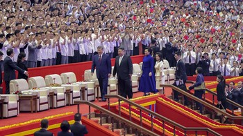 Chinese President Xi Jinping, his wife Peng Liyuan, North Korean leader Kim Jong Un, and his wife Ri Sol Ju walk together as they attend a performance at the Pyongyang Indoor Stadium, during Xi's state visit, in Pyongyang, North Korea, June 8, 2026,