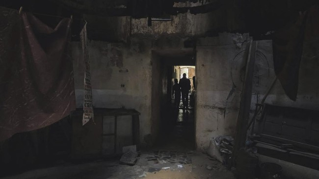 People walk inside the