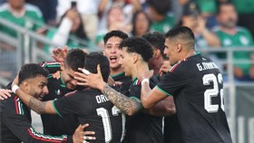 PASADENA, CALIFORNIA - MAY 30: Johan Vasquez of Mexico celebrates after scoring the team's first goal with teammates during the international friendly match between Mexico and Australia at Rose Bowl Stadium on May 30, 2026 in Pasadena, California.