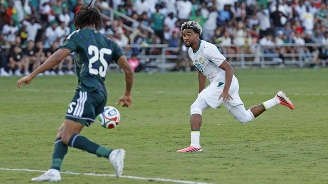 SAN ANTONIO, TX -JUNE 9: Ibrahim Mbaye #20 of Senegal looks to drive past Jehad Thakri #25 of Saudi Arabia in the second half of the international friendly match between Saudi Arabia and Senegal on June 9, 2026 at Toyota Field in San Antonio, Texas.