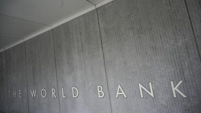 The World Bank Group logo is seen on the building of the Washington-based global development lender in Washington on January 17, 2019. World Bank current President Jim Yong Kim announced on January 7, 2019, that he would cut short his tenure as presi