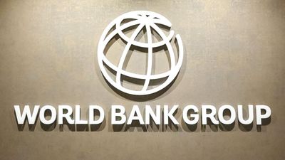 FILE PHOTO: The World Bank Group logo is displayed on a office wall at the International Finance Corporation in Karachi, Pakistan February 4, 2026. REUTERS/Akhtar Soomro/File Photo