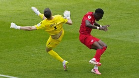 Soccer Football - FIFA World Cup 2026 - Group B - Canada v Bosnia and Herzegovina - Toronto Stadium, Toronto, Canada - June 12, 2026 Bosnia and Herzegovina's Nikola Vasilj collides with Canada's Tani Oluwaseyi IMAGN IMAGES via Reuters/Kevin Sousa