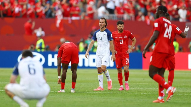 Soccer Football - FIFA World Cup 2026 - Group B - Canada v Bosnia and Herzegovina - Toronto Stadium, Toronto, Canada - June 12, 2026 Bosnia and Herzegovina's Ivan Sunjic and Canada's Jonathan Osorio react after the match REUTERS/Claudia Greco