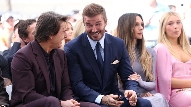 David Beckham attends his star unveiling ceremony on the Hollywood Walk of Fame, accompanied by his wife Victoria Beckham and Tom Cruise, in Los Angeles, California, U.S., June 12, 2026. REUTERS/Mario Anzuoni