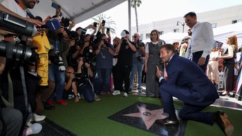 David Beckham poses on his star after it was unveiled on the Hollywood Walk of Fame in Los Angeles, California, U.S., June 12, 2026. REUTERS/Mario Anzuoni