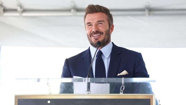 David Beckham speaks during his star unveiling ceremony on the Hollywood Walk of Fame, in Los Angeles, California, U.S., June 12, 2026. REUTERS/Mario Anzuoni