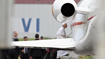 Pope Leo XIV embarks a new aircraft offered by Spanish King Felipe VI (L) after his first plane's takeoff was delayed due to an incident at Los Rodeos International Airport on the Canary Island of Tenerife on June 12, 2026. Pope Leo XIV will return t