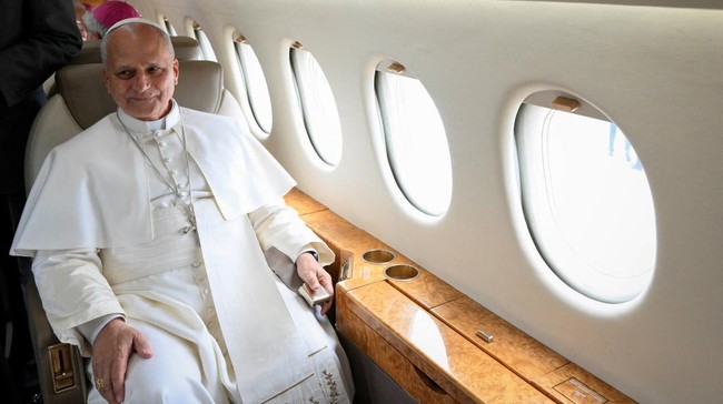 Pope Leo XIV sits on board a Falcon 900B Spanish Air Force plane that was offered by Spain's King Felipe VI after the aircraft the Pope was due to depart with had a technical issue, according to local media, at Tenerife Norte–Ciudad de La Laguna Ai