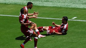 Soccer Football - FIFA World Cup 2026 - Group B - Qatar v Switzerland - San Francisco Bay Area Stadium, Santa Clara, California, U.S. - June 13, 2026 Qatar's Boualem Khoukhi celebrates scoring their first goal with teammates REUTERS/Eloisa Lopez