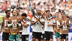 Soccer Football - FIFA World Cup 2026 - Group E - Germany v Curacao - Houston Stadium, Houston, Texas, U.S. - June 14, 2026 Germany's Jonathan Tah, Aleksandar Pavlovic and Jamal Musiala celebrate after the match IMAGN IMAGES via Reuters/Maria Lysaker