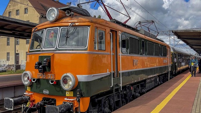The bright orange locomotive of the