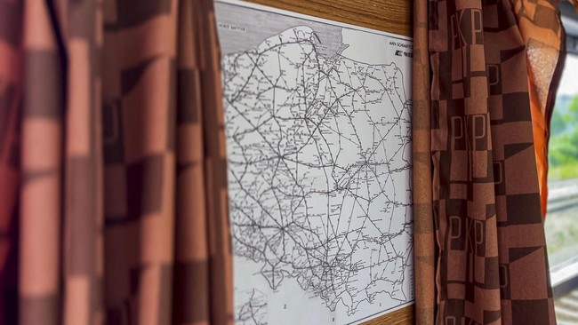 A retro-style map of Polish rail network aboard the