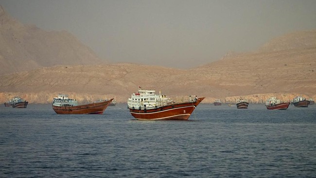 Vessels are anchored in the Strait of Hormuz, as seen from Musandam, Oman, June 11, 2026. REUTERS/Stringer