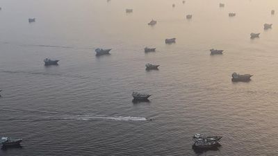 Vessels are anchored in the Strait of Hormuz, as seen from Musandam, Oman, June 11, 2026. REUTERS/Stringer