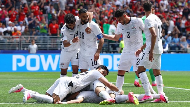 Soccer Football - FIFA World Cup 2026 - Group G - Belgium v Egypt - Seattle Stadium, Seattle, Washington, U.S. - June 15, 2026 Egypt's Emam Ashour celebrates scoring their first goal with teammates REUTERS/Agustin Marcarian