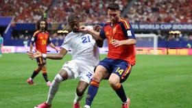 Soccer Football - FIFA World Cup 2026 - Group H - Spain v Cape Verde - Atlanta Stadium, Atlanta, Georgia, U.S. - June 15, 2026 Spain's Aymeric Laporte in action with Cape Verde's Nuno Da Costa REUTERS/Siphiwe Sibeko