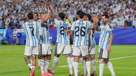 Soccer Football - FIFA World Cup 2026 - Group J - Argentina v Algeria - Kansas City Stadium, Kansas City, Missouri, U.S. - June 16, 2026 Argentina's Lionel Messi celebrates scoring their third goal with Nahuel Molina to complete a hat-trick IMAGN IMA