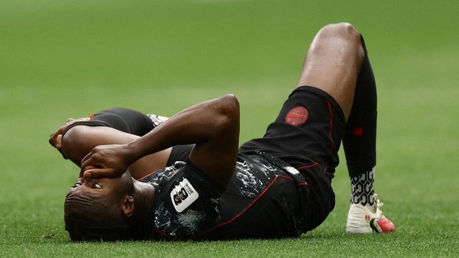 Soccer Football - FIFA World Cup 2026 - Group B - Canada v Qatar - BC Place, Vancouver, Canada - June 18, 2026 Canada's Ismael Kone lays on the ground after sustaining an injury REUTERS/Lee Smith     TPX IMAGES OF THE DAY