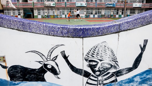Children play basketball at a school on Orchid Island, Taiwan, June 14, 2026. REUTERS/Ann Wang
