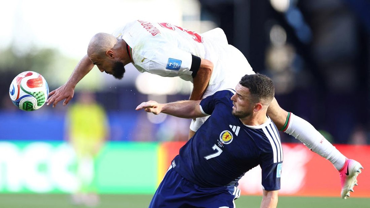 Soccer Football - FIFA World Cup 2026 - Group C - Scotland v Morocco - Boston Stadium, Foxborough, Massachusetts, U.S. - June 19, 2026 Scotland's John McGinn in action with Morocco's Noussair Mazraoui. REUTERS/Peter Cziborra