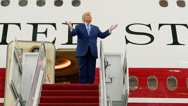U.S. President Donald Trump gestures as he tours the VC-25B aircraft gifted by Qatar that will be used as Air Force One, at Joint Base Andrews, Maryland, U.S., June 19, 2026. REUTERS/Elizabeth Frantz