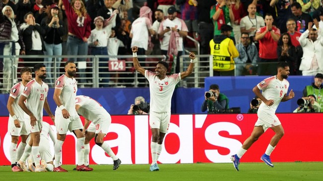 Soccer Football - FIFA World Cup 2026 - Group J - Austria v Jordan - San Francisco Bay Area Stadium, Santa Clara, California, U.S. - June 16, 2026 Jordan's Abdallah Nasib celebrates with teammates after Ali Olwan scores their first goal IMAGN IMAGES