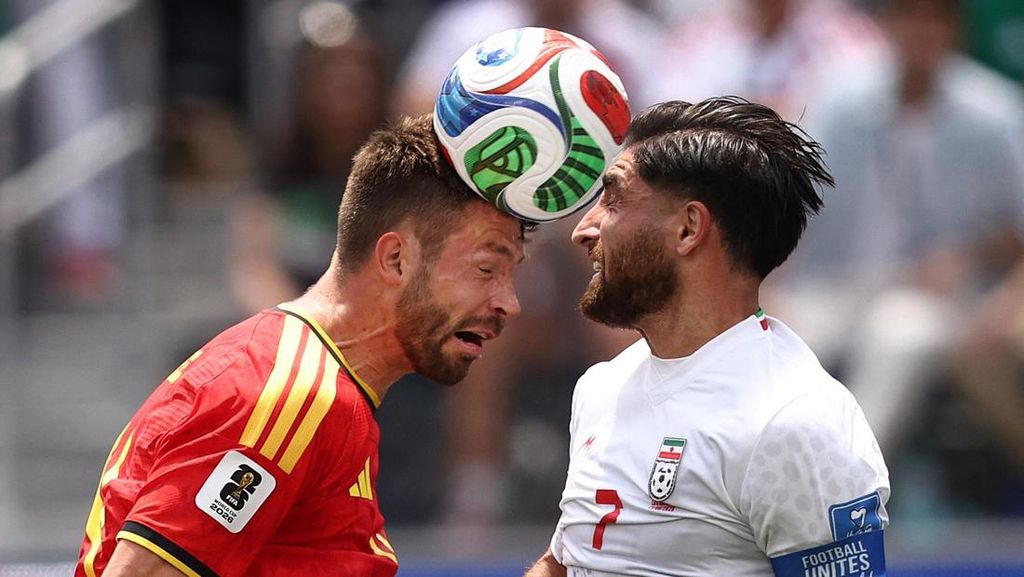 FOTO: Iran dan Belgia Berbagi Peluang Menuju 32 Besar