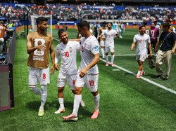 Soccer Football - FIFA World Cup 2026 - Group G - Belgium v Iran - Los Angeles Stadium, Inglewood, California, U.S. - June 21, 2026 Iran's Mohammad Mohebbi, Mehdi Ghayedi and Ali Nemati walk off the pitch after the match REUTERS/Daniel Cole