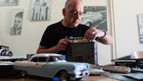 Wassim al-Haffar works on restoring a classic car at his workshop, in Damascus, Syria June 6, 2026. REUTERS/Firas Makdesi