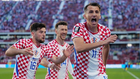 Soccer Football - FIFA World Cup 2026 - Group L - Panama v Croatia - Toronto Stadium, Toronto, Canada - June 23, 2026 Croatia's Ante Budimir celebrates scoring their first goal with Ivan Perisic and Martin Baturina. IMAGN IMAGES via Reuters/John E So