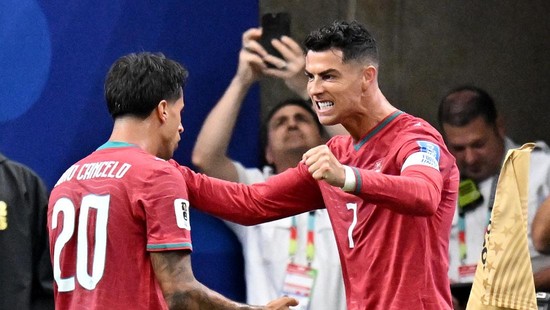 Soccer Football - FIFA World Cup 2026 - Group K - Portugal v Uzbekistan - Houston Stadium, Houston, Texas, U.S. - June 23, 2026 Portugal's Cristiano Ronaldo celebrates scoring their third goal with Joao Cancelo IMAGN IMAGES via Reuters/Maria Lysaker