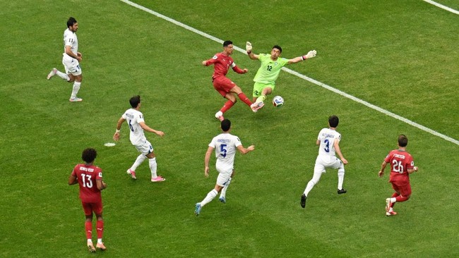 Soccer Football - FIFA World Cup 2026 - Group K - Portugal v Uzbekistan - Houston Stadium, Houston, Texas, U.S. - June 23, 2026 Uzbekistan's Abduvohid Nematov makes a save from Portugal's Cristiano Ronaldo following a free kick REUTERS/Annegret Hilse
