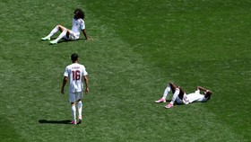 Soccer Football - FIFA World Cup 2026 - Group B - Bosnia and Herzegovina v Qatar - Seattle Stadium, Seattle, Washington, U.S. - June 24, 2026 Qatar's Akram Afif, Almoez Ali and Boualem Khoukhi look dejected after the match REUTERS/Eloisa Lopez     TP