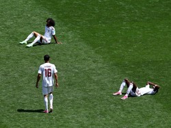 Soccer Football - FIFA World Cup 2026 - Group B - Bosnia and Herzegovina v Qatar - Seattle Stadium, Seattle, Washington, U.S. - June 24, 2026 Qatar's Akram Afif, Almoez Ali and Boualem Khoukhi look dejected after the match REUTERS/Eloisa Lopez     TP