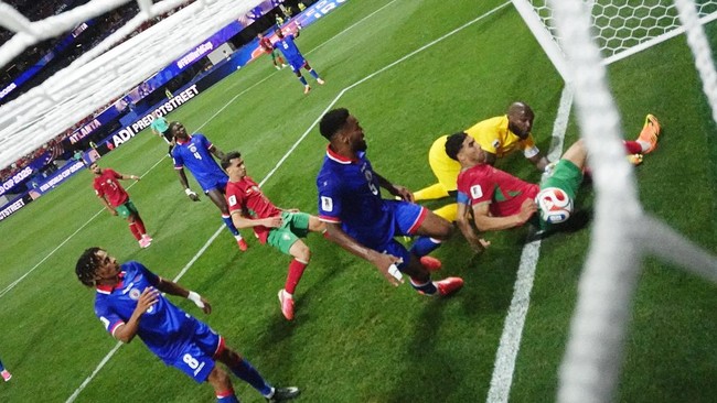 Soccer Football - FIFA World Cup 2026 - Group C - Morocco v Haiti - Atlanta Stadium, Atlanta, Georgia, U.S. - June 24, 2026 Morocco's Achraf Hakimi scores their first goal past Haiti's Johny Placide REUTERS/Claudia Greco