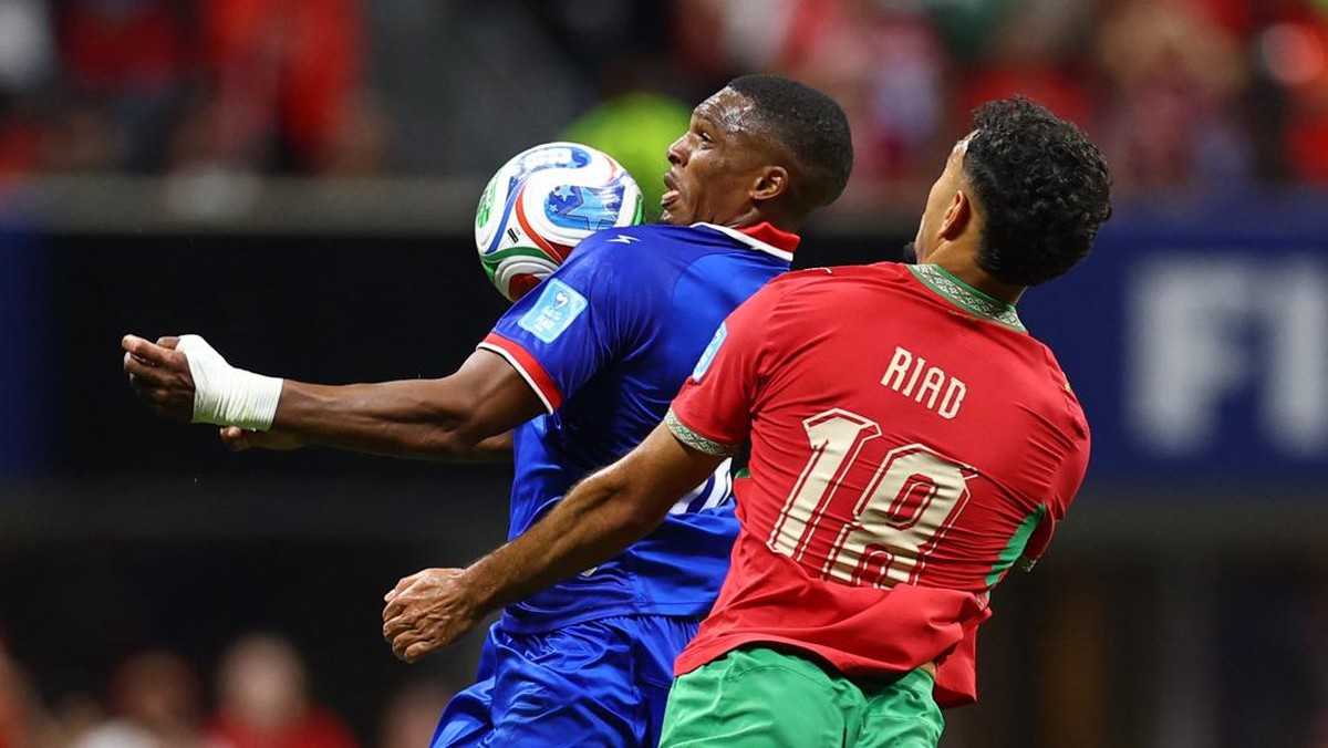 Soccer Football - FIFA World Cup 2026 - Group C - Morocco v Haiti - Atlanta Stadium, Atlanta, Georgia, U.S. - June 24, 2026 Haiti's Lenny Joseph in action with Morocco's Chadi Riad REUTERS/Claudia Greco