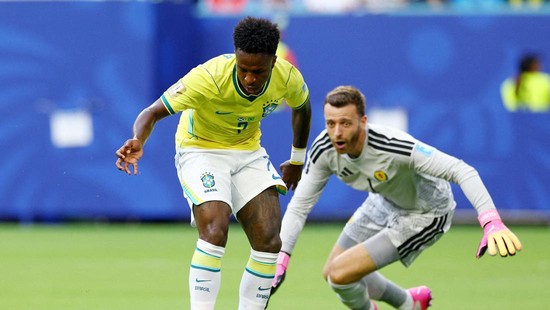 Soccer Football - FIFA World Cup 2026 - Group C - Scotland v Brazil - Miami Stadium, Miami Gardens, Florida, U.S. - June 24, 2026 Brazil's Vinicius Junior scores their first goal past Scotland's Angus Gunn IMAGN IMAGES via Reuters/Nathan Ray Seebeck