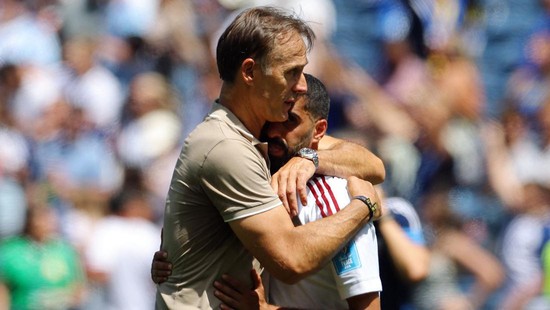 Soccer Football - FIFA World Cup 2026 - Group B - Bosnia and Herzegovina v Qatar - Seattle Stadium, Seattle, Washington, U.S. - June 24, 2026 Qatar's Hassan Alhaydos and coach Julen Lopetegui look dejected after the match as Qatar are eliminated from